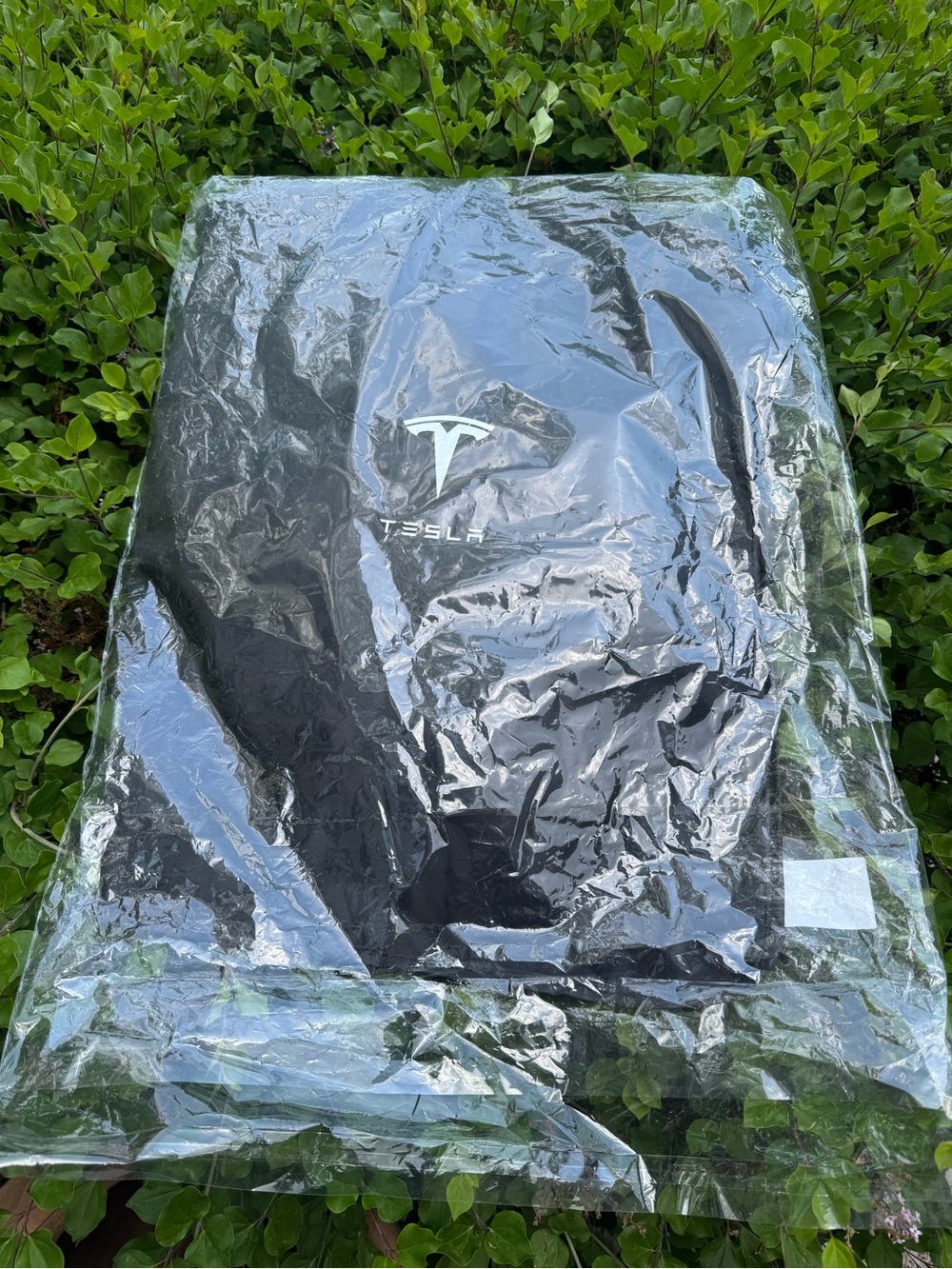 Tesla Glass Roof
Sunshade in its original storage bag.